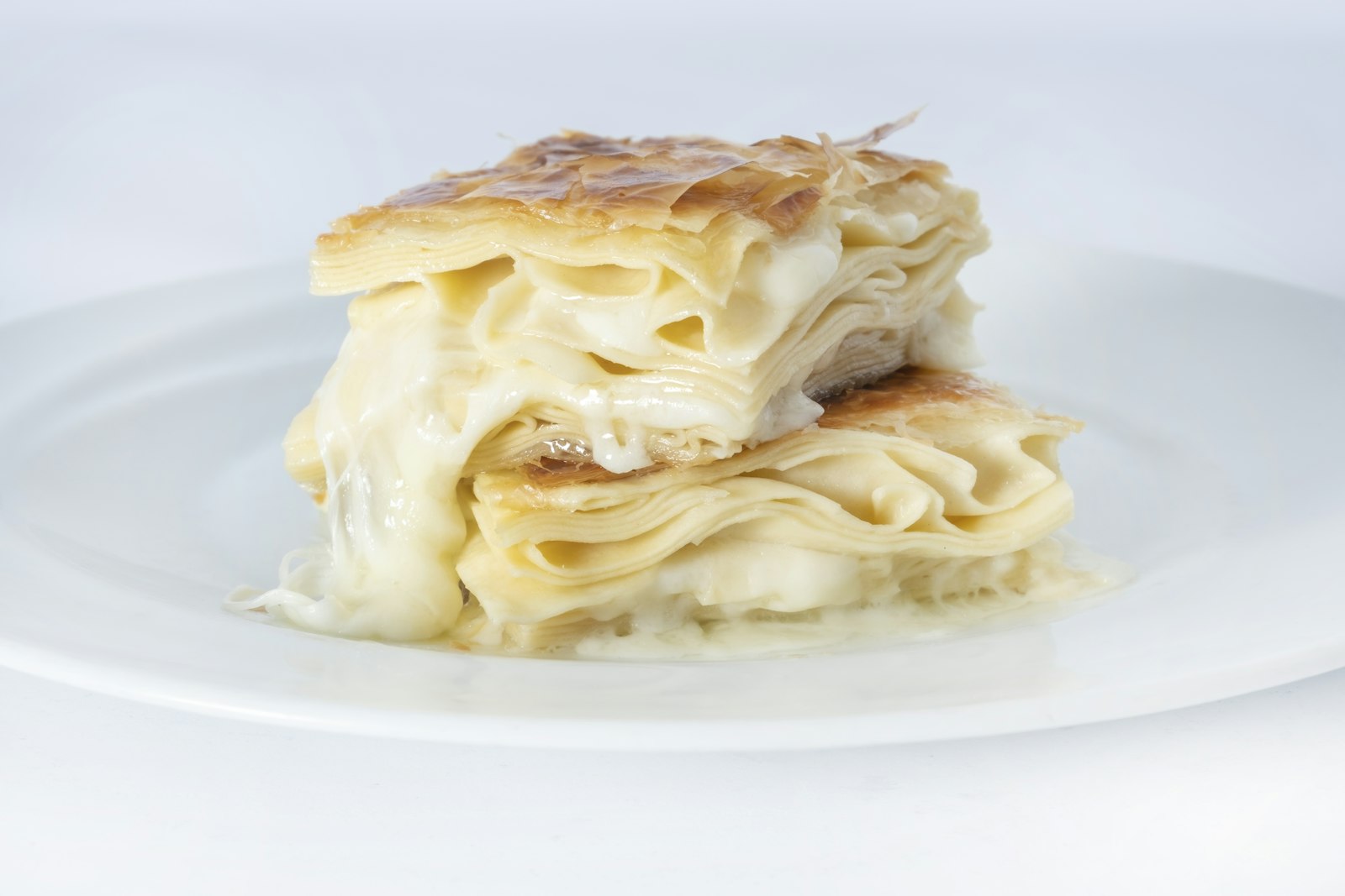 Traditional Mediterranean dish plated on white ceramic — Albanian cuisine